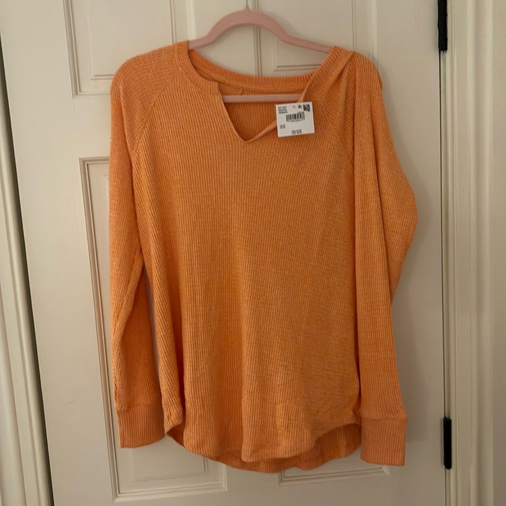 Orange knit sweater